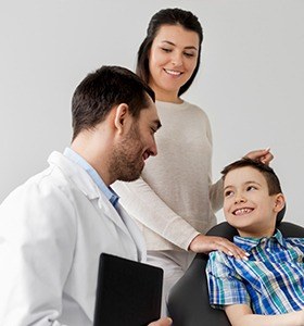 Smiling young boy in orthodontic chair