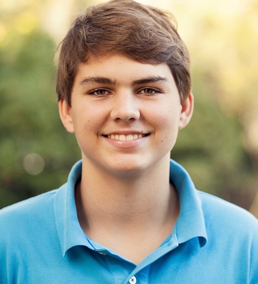 Teen boy with healthy aligned smile