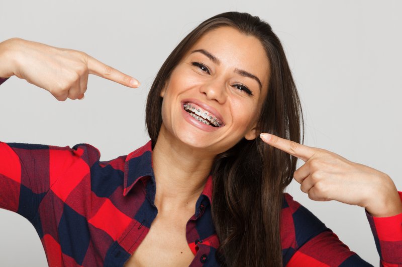 young woman with metal braces