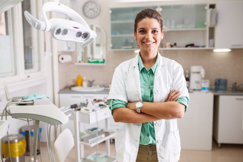A female orthodontist standing in her office